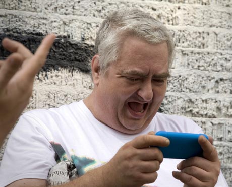Daniel playing iphone game
